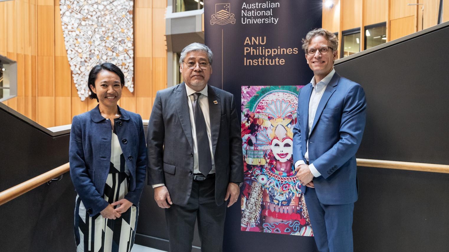 Luka Vertessy ANU College of Asia Pacific Secretary Manalo stands with ANU Philippines Institute director Björn Dressel and visiting Secretary for Southeast Asia and Global Partners in DFAT Michelle Chan.