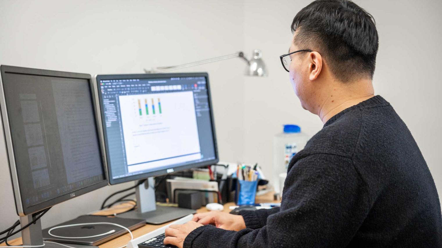 PhD candidate Huade Huang sits in his office undertaking his research. PhD candidate Huade Huang sits in his office undertaking his research.