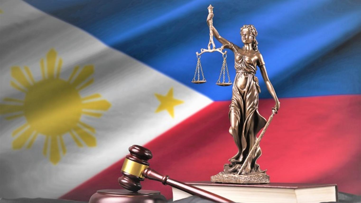 Graphic of Lady Justice and legal text with Philippines flag background by mehaniq41 used under Adobe Education License  